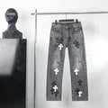 Chrome pants in dark gray denim with cross graphic patches on the legs