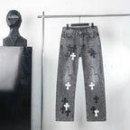 Chrome pants in dark gray denim with cross graphic patches on the legs