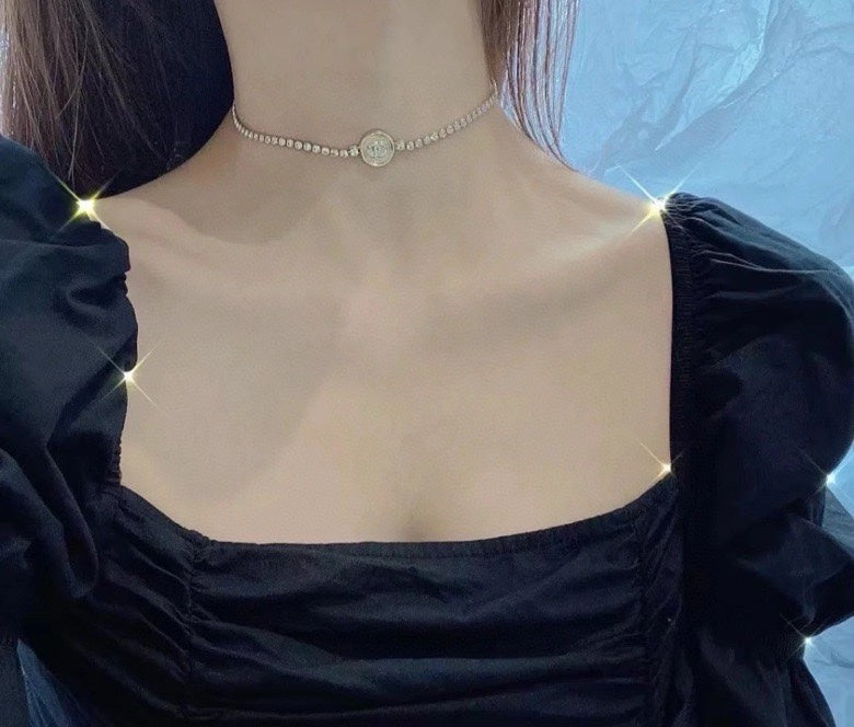 Chanel pearl-bead choker necklace with round logo pendant