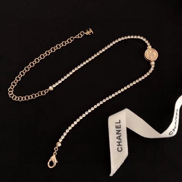 Chanel pearl-bead necklace with round logo pendant and small drop clasp