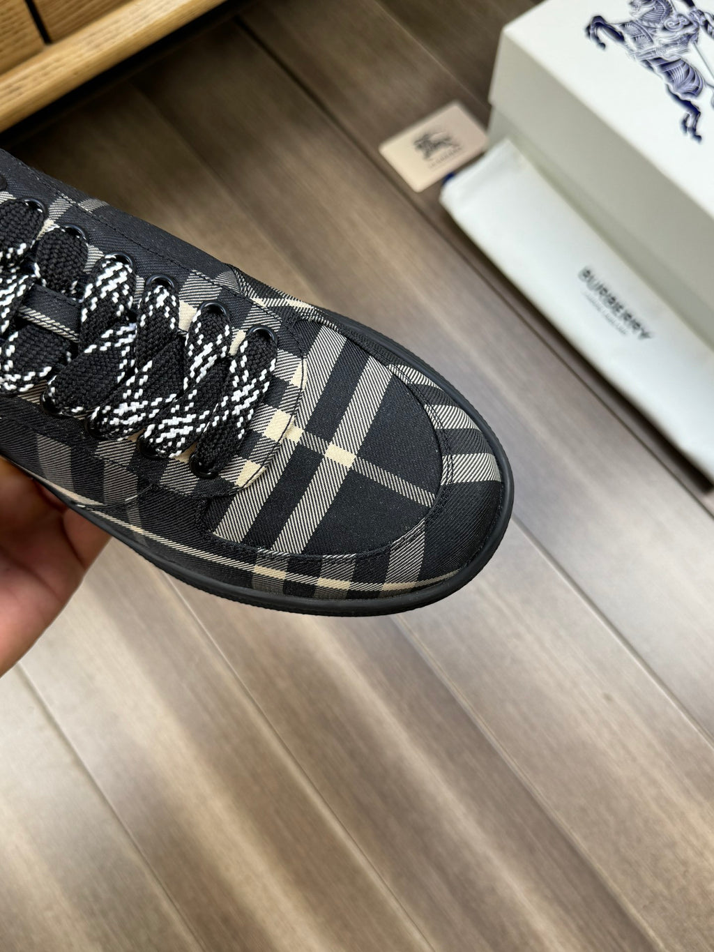 Burberry lace-up sneakers, close-up toe, black check fabric with blue lining