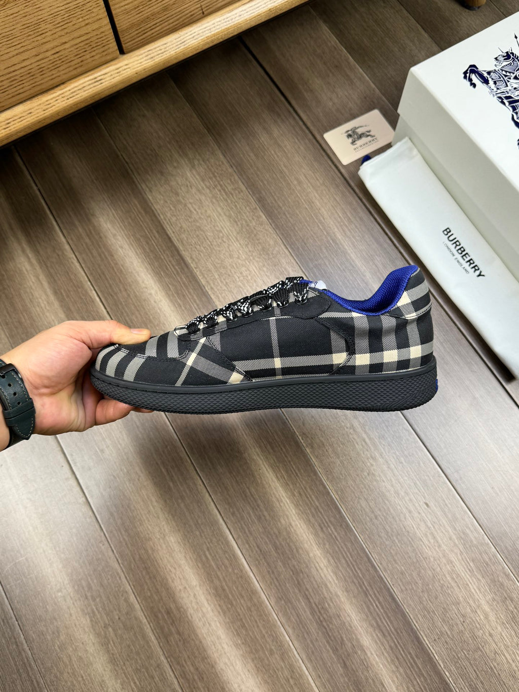 Burberry lace-up sneakers, hand-held side, black plaid upper with blue accents