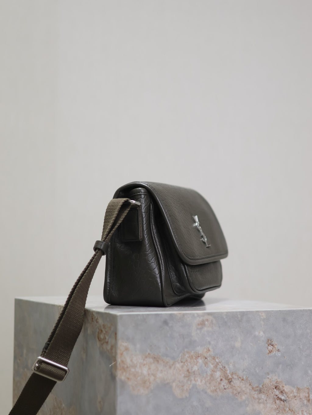 YSL small shoulder bag back/side view in black leather with turn-lock flap