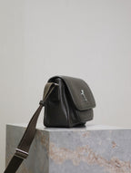 YSL small shoulder bag back/side view in black leather with turn-lock flap