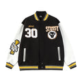 Black varsity jacket with button front, Stüssy logo patch and number 30 graphic