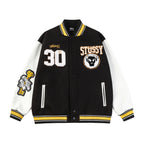 Black varsity jacket with button front, Stüssy logo patch and number 30 graphic
