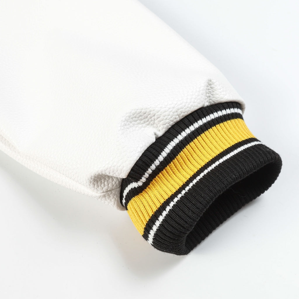 Black varsity jacket sleeve cuff with yellow, white, and black ribbed stripes