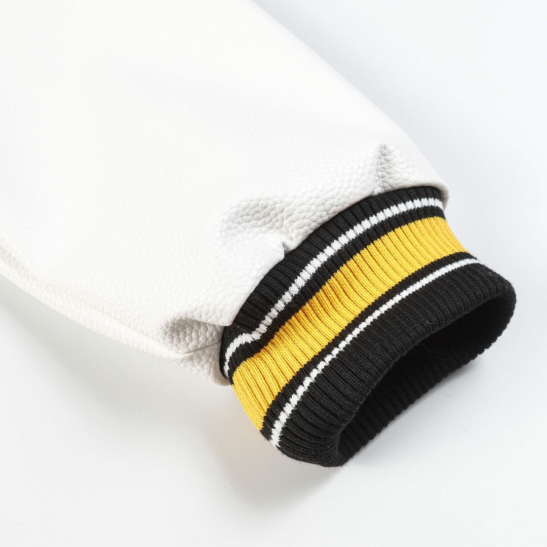 Black varsity jacket sleeve cuff with yellow, white, and black ribbed stripes