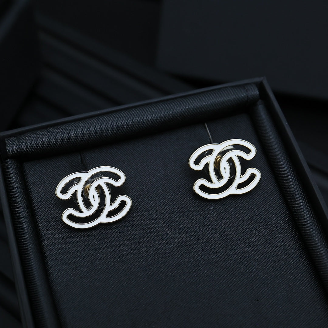CC logo stud earrings, silver-toned with glossy black enamel