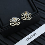CC logo stud earrings with gold-toned posts and silver-toned designs