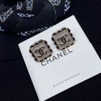 Square stud earrings with silver Chanel logo and scalloped metal edging