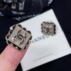 Silver-tone square stud earrings with Chanel logo, scalloped edge design