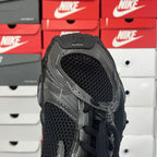 Balenciaga unisex running shoe, black mesh side with gray stitched overlays and laces