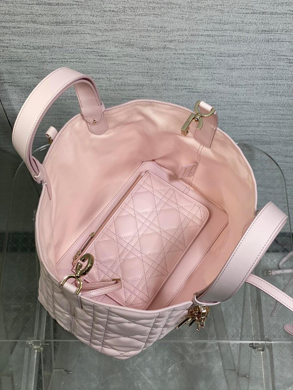 Dior handbag light pink quilted leather with open interior and zipped pocket