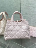 Dior handbag light pink quilted leather with double handles and gold hardware