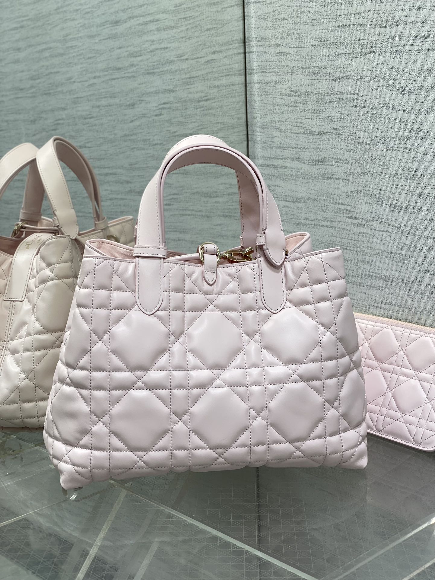 Dior handbag light pink quilted leather with double handles and gold hardware