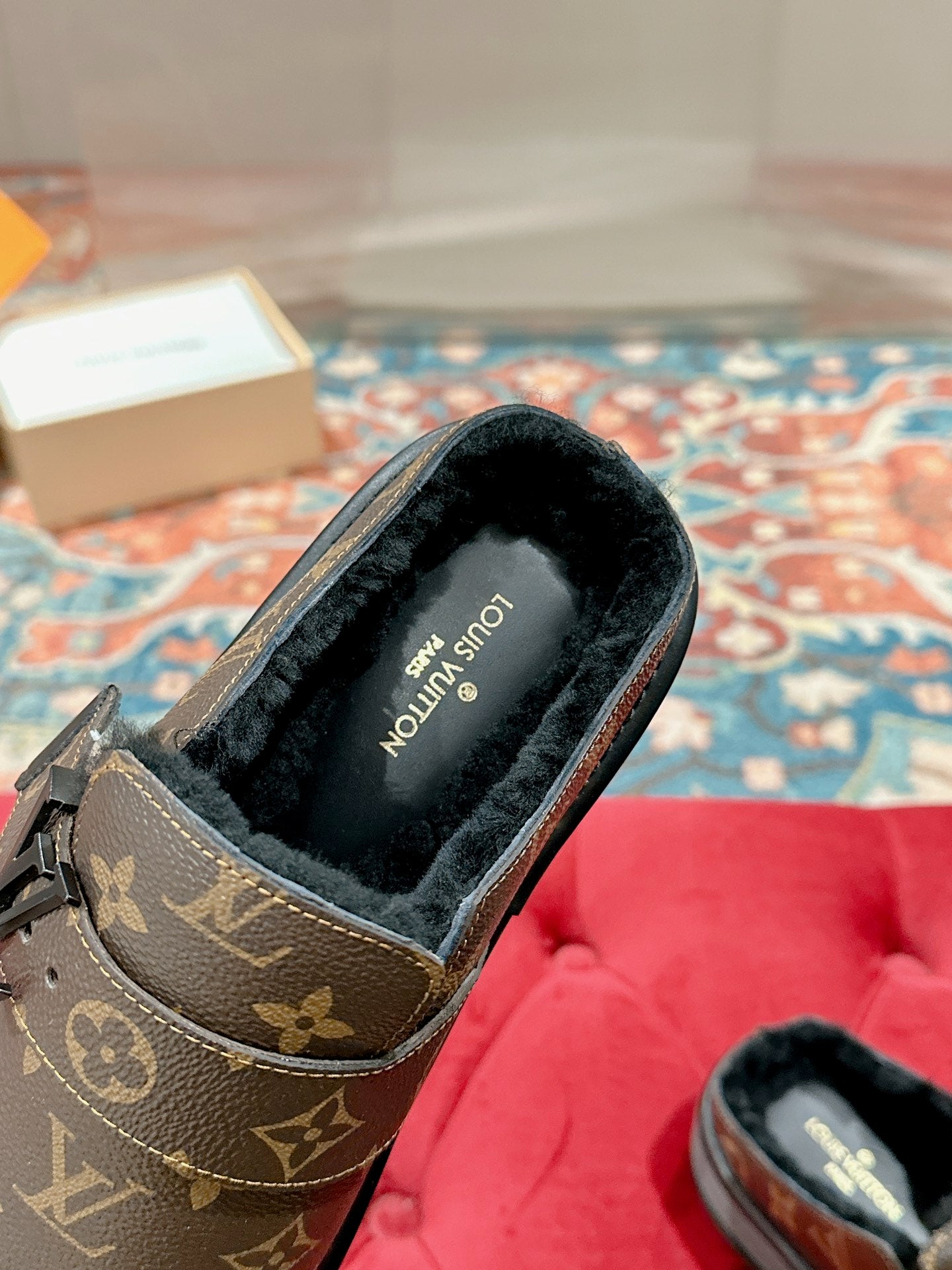 Louis Vuitton monogram slip-on sandal with fur-like lining and printed insole