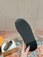 Louis Vuitton monogram sandal outsole with ribbed tread pattern