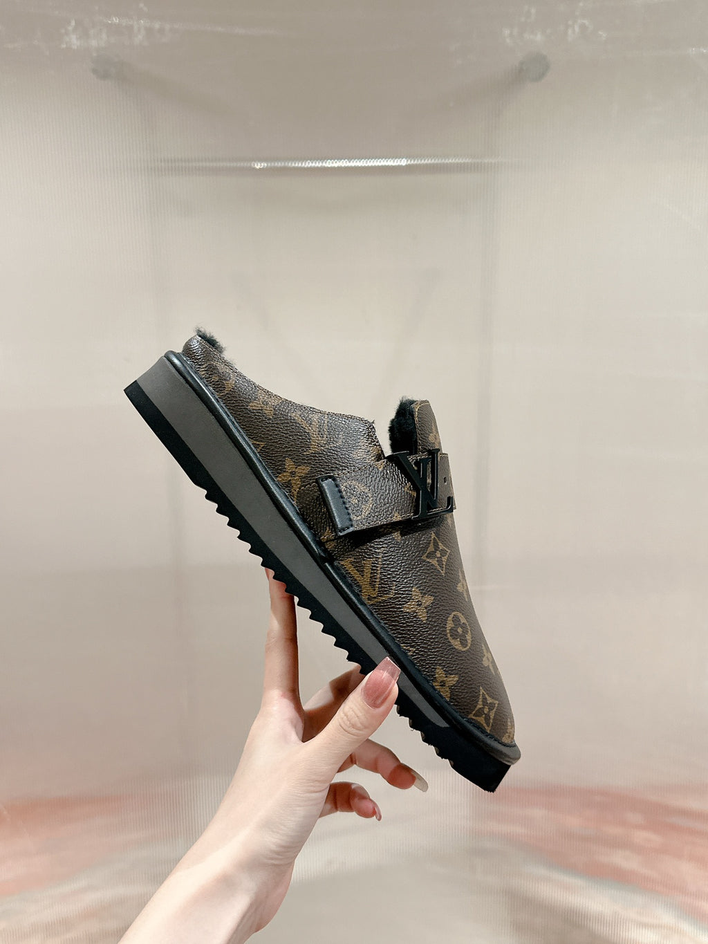 Louis Vuitton monogram slip-on sandals with ribbed, grippy outsole and strap detail