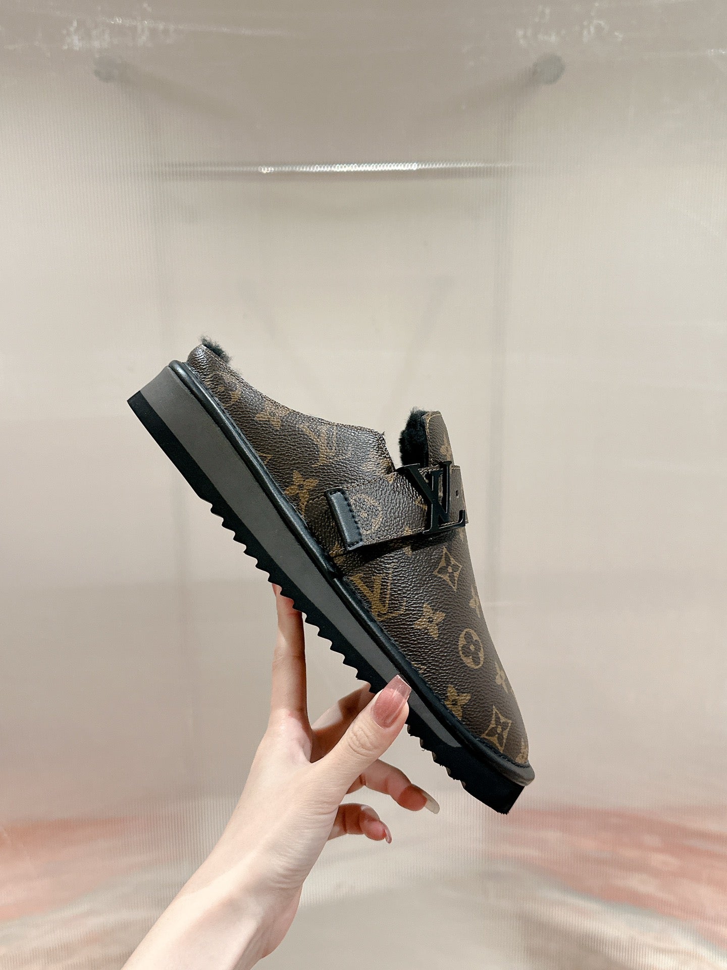 Louis Vuitton monogram slip-on sandals with ribbed, grippy outsole and strap detail