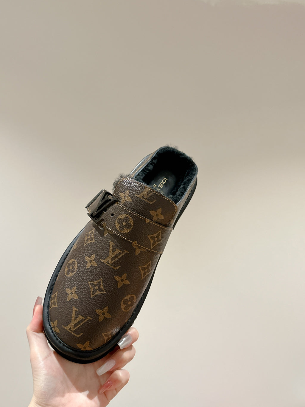 Louis Vuitton monogram slip-on sandal with adjustable buckle strap and dark lining