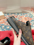 Louis Vuitton monogram slip-on sandal with adjustable strap and ribbed sole