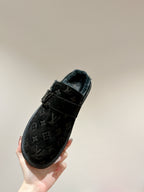 Black Louis Vuitton monogram sandal with wide strap and slip-on style