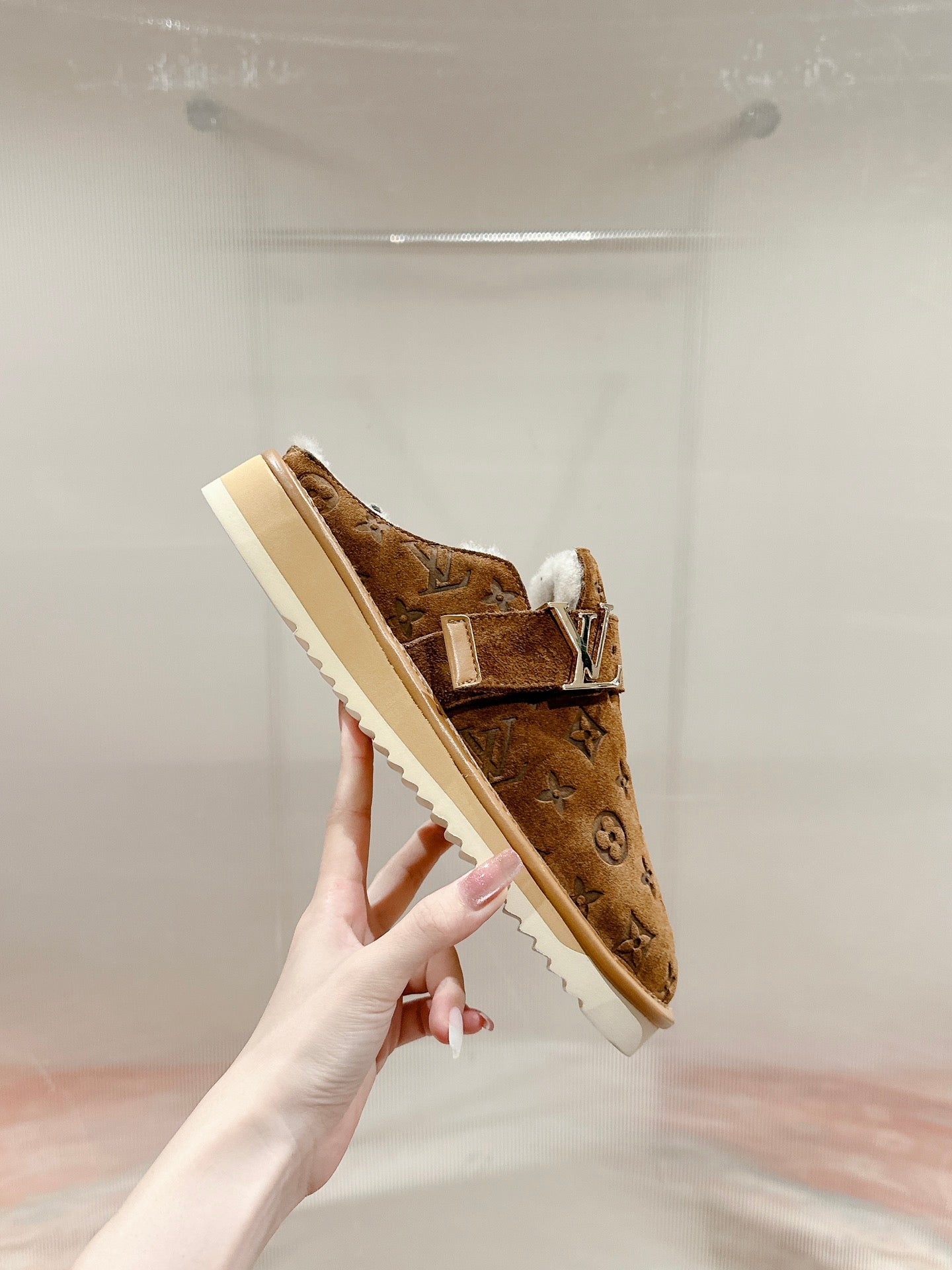 Louis Vuitton brown suede slide sandals with monogram pattern and white padded lining
