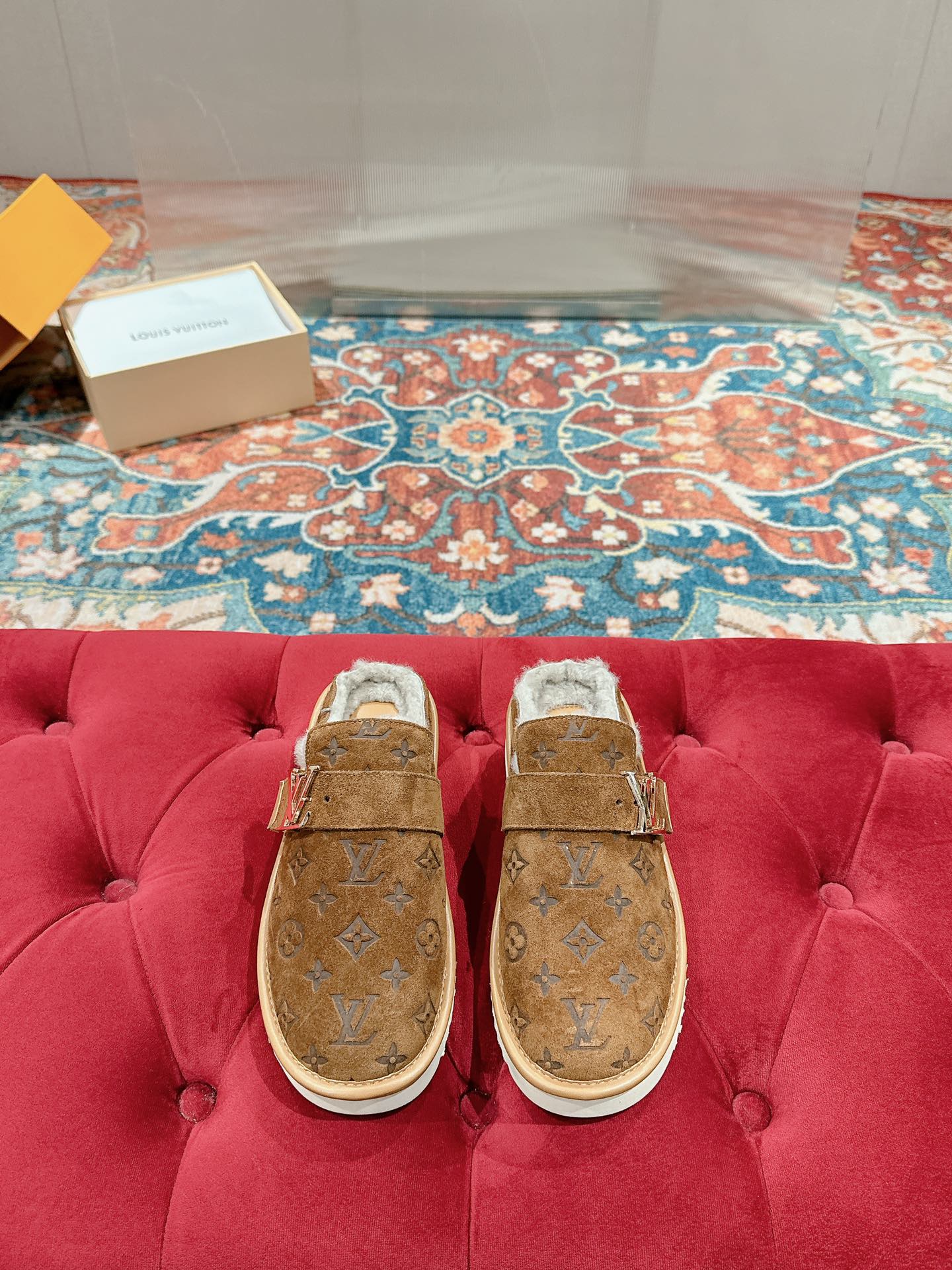 Louis Vuitton brown monogram suede sandals with adjustable strap and white faux-fur lining