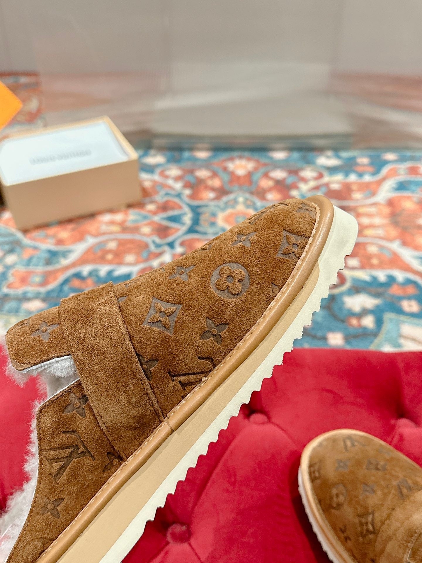 Louis Vuitton brown monogram suede slide sandal with white sole and strap detail