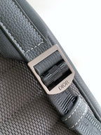 Gray leather strap with adjustable buckle and DIOR logo plaque