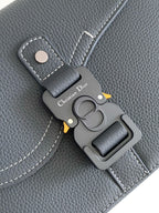 Dior bag key holder charm with Christian Dior text and snap clip