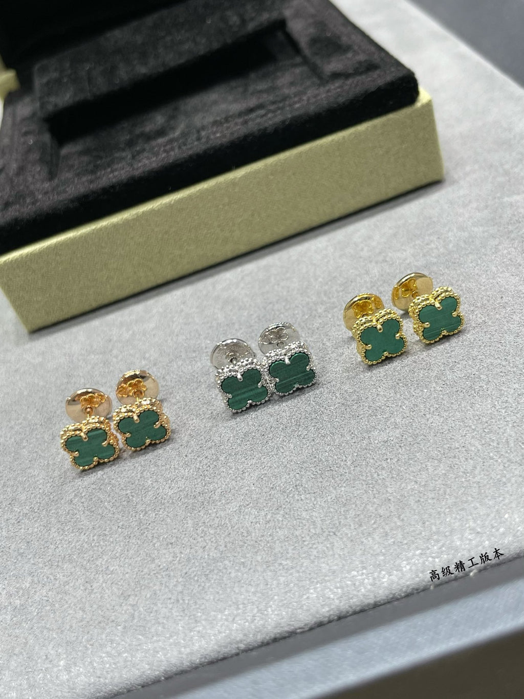 Van Cleef & Arpels clover stud earrings with green enamel, gold and silver pair set