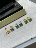 Van Cleef & Arpels clover stud earrings with green enamel, gold and silver tones