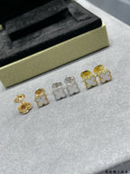 Clover stud earrings set with gold-tone and silver-tone studs, five-piece display