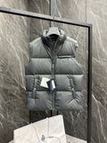 Light gray puffer vest with full front zipper and hood, Prada triangle logo on chest