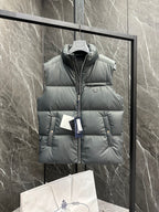 Light gray puffer vest with full front zipper and hood, Prada triangle logo on chest