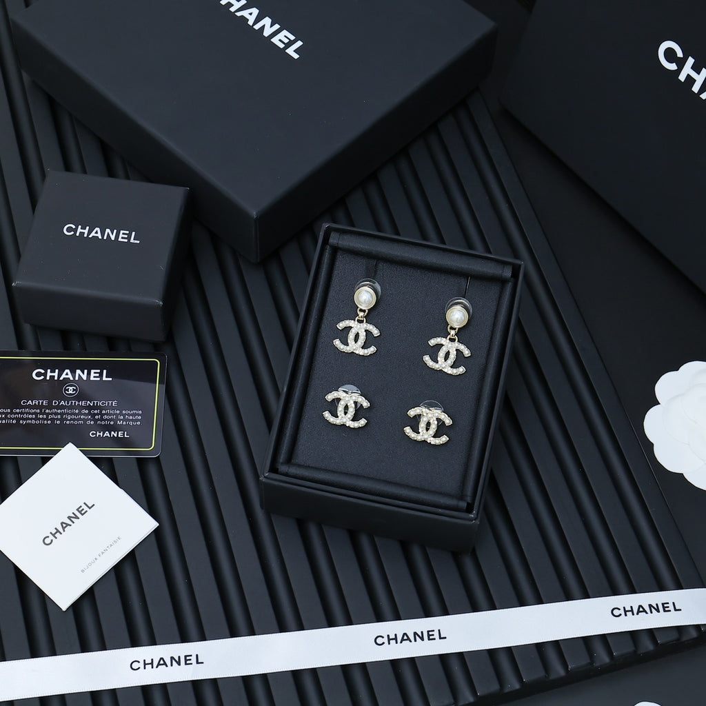 Chanel accessory set: four CC stud earrings with faux pearls and crystal outlines