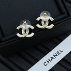 Chanel accessory: gold-tone CC drop earrings with faux pearl and crystal details