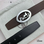 Brown leather belt with silver oval buckle, showing multiple belt holes