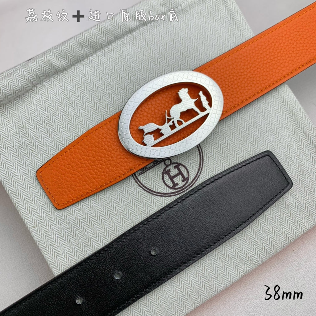 Hermes belt set, orange leather with silver oval logo buckle and black strap with punched holes