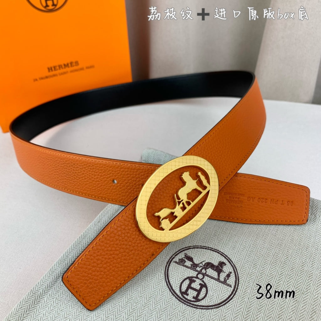 Hermes belt, orange leather with gold-toned oval buckle and side keeper strap