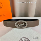 Hermes leather belt with taupe strap and silver oval horse-logo buckle