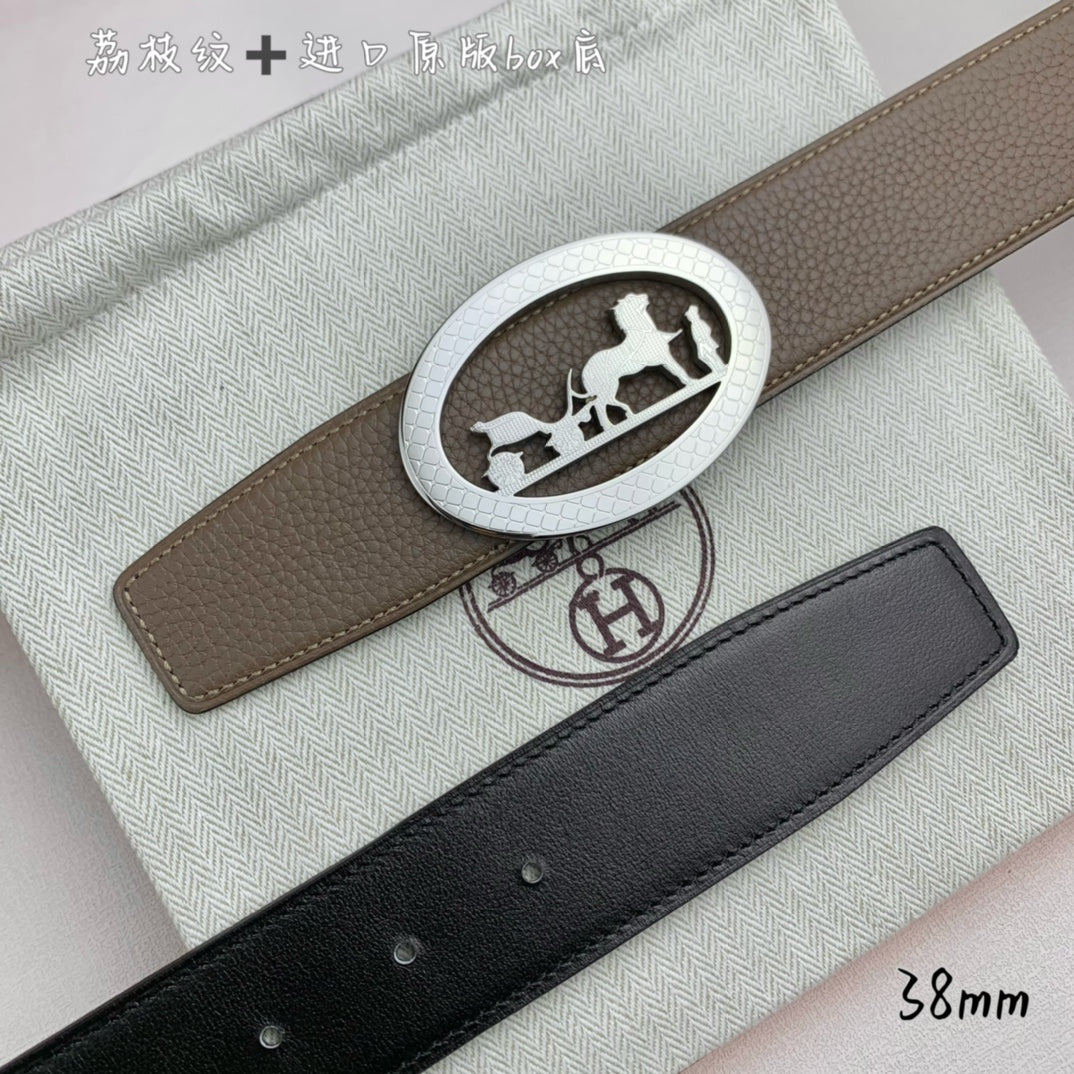 Hermes leather belt with taupe strap and silver oval buckle, black strap beneath
