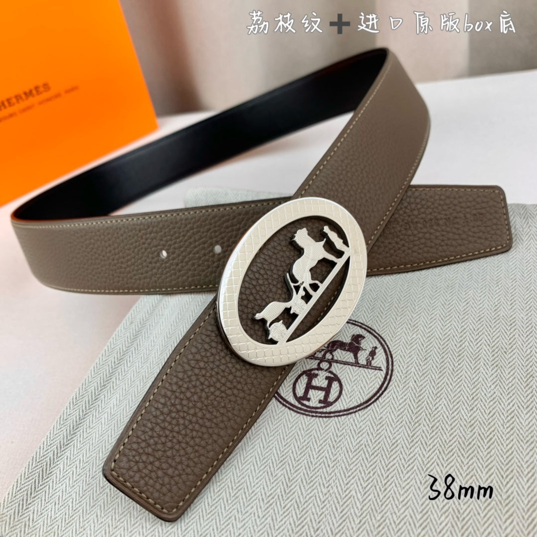 Hermes leather belt with taupe strap and silver oval buckle