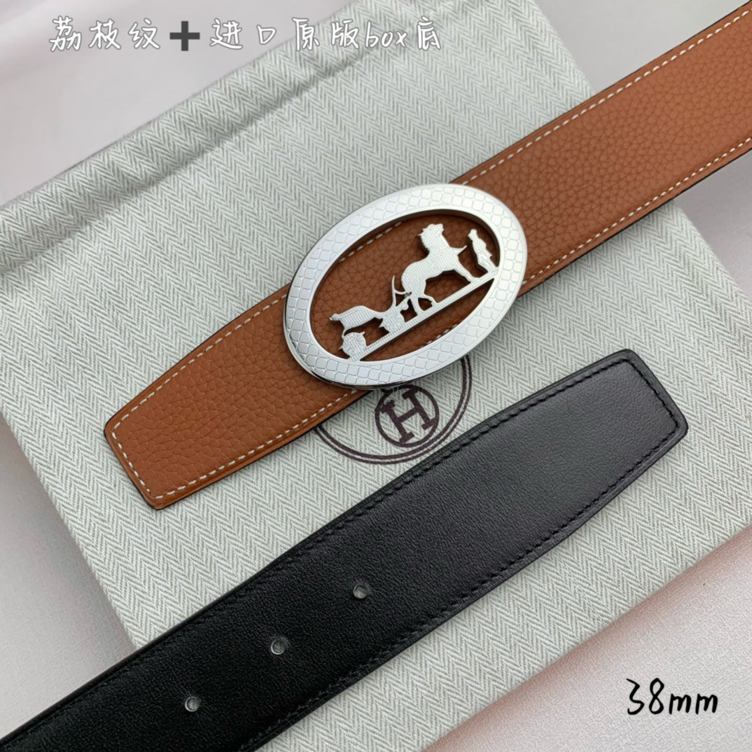 Hermes belt set: tan leather belt with silver oval buckle and black leather belt.