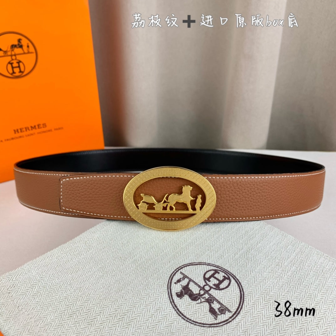 Hermes belt in tan leather with gold-tone oval buckle and horse rider motif.