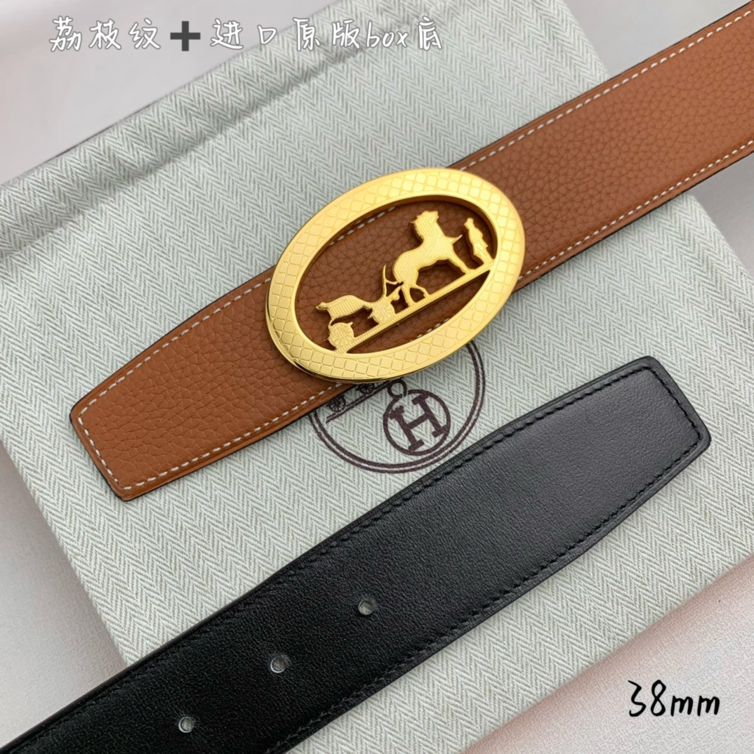 Hermes belt set: tan leather belt with gold oval buckle and black leather belt.