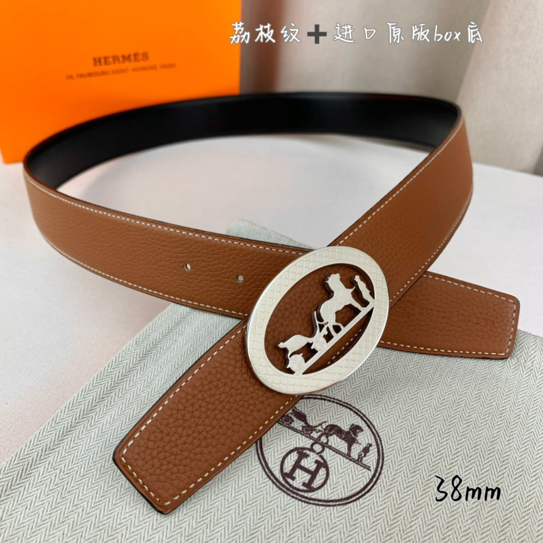 Hermes belt in tan leather with silver-tone oval buckle and stitched strap end.