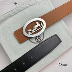 Brown leather belt with silver horse-motif buckle; 38mm, plus black belt beside it.